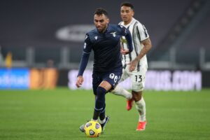 Mohamed Fares of SS Lazio is pursued by Danilo of Juventus  as he breaks forwards with the ball during the Serie A match at Allianz Stadium, Turin. Picture date: 6th March 2021. Picture credit should read: Jonathan Moscrop/Sportimage via PA Images